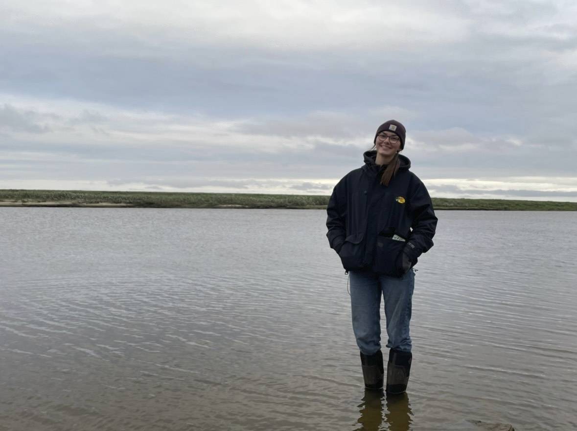 Lauren standing in the Meade river outside Atqasuk, AK